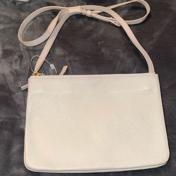 Celine Handbags - Preloved Celine white trio shoulder sling/clutch bag great condition